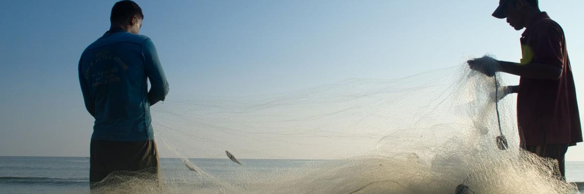 Two fishermen with net